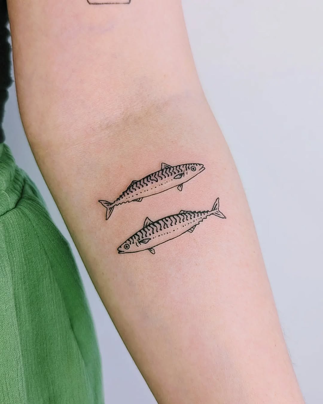 Elegant fish skeleton tattoos for Pisces lovers