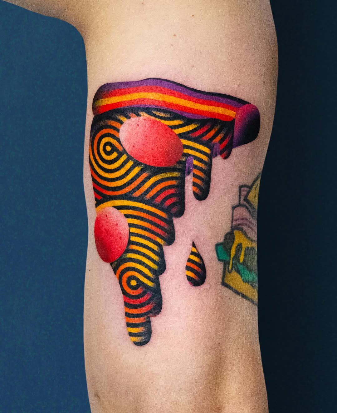 Colorful slice tattoo oozing with flavor