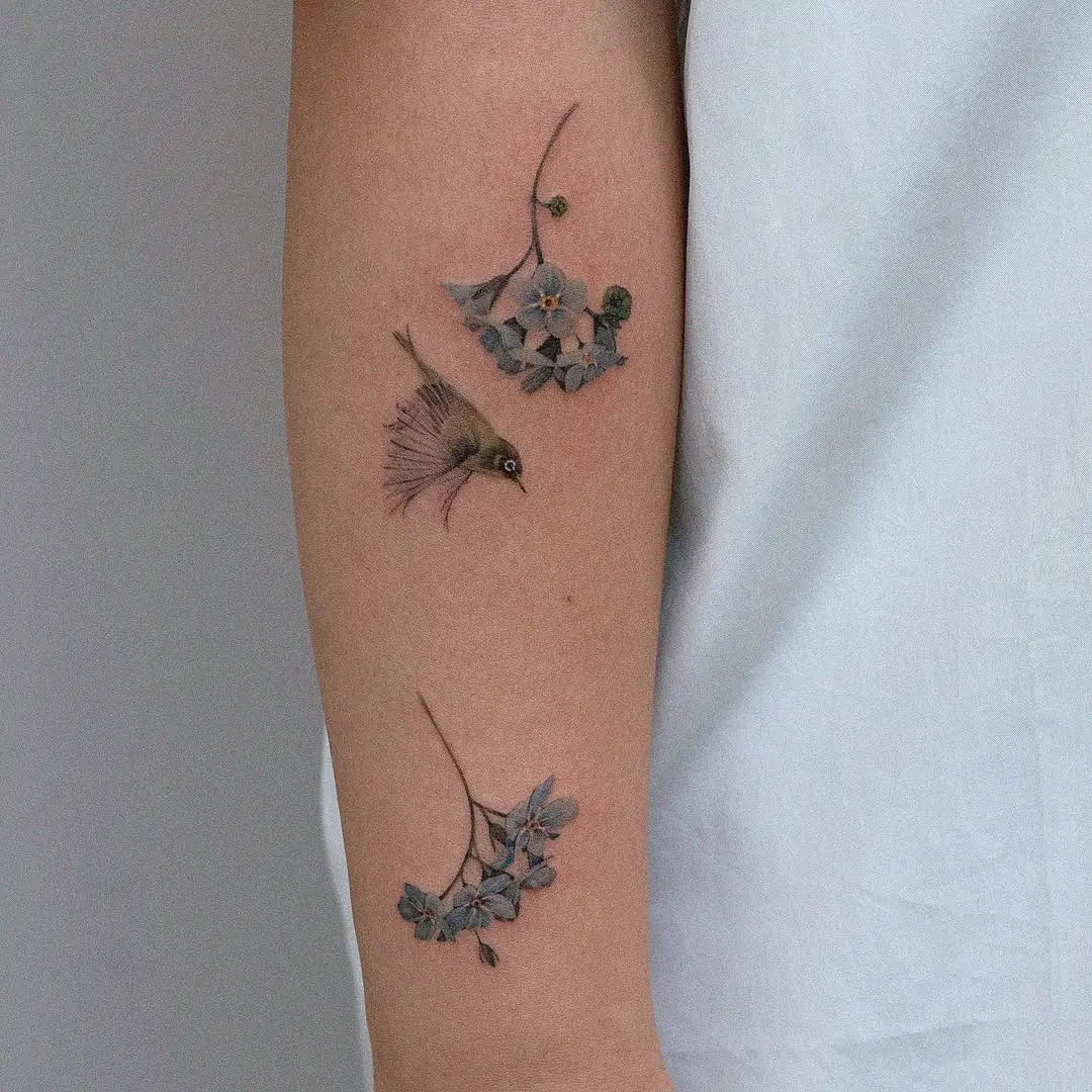 Delicate bird surrounded by floral elements
