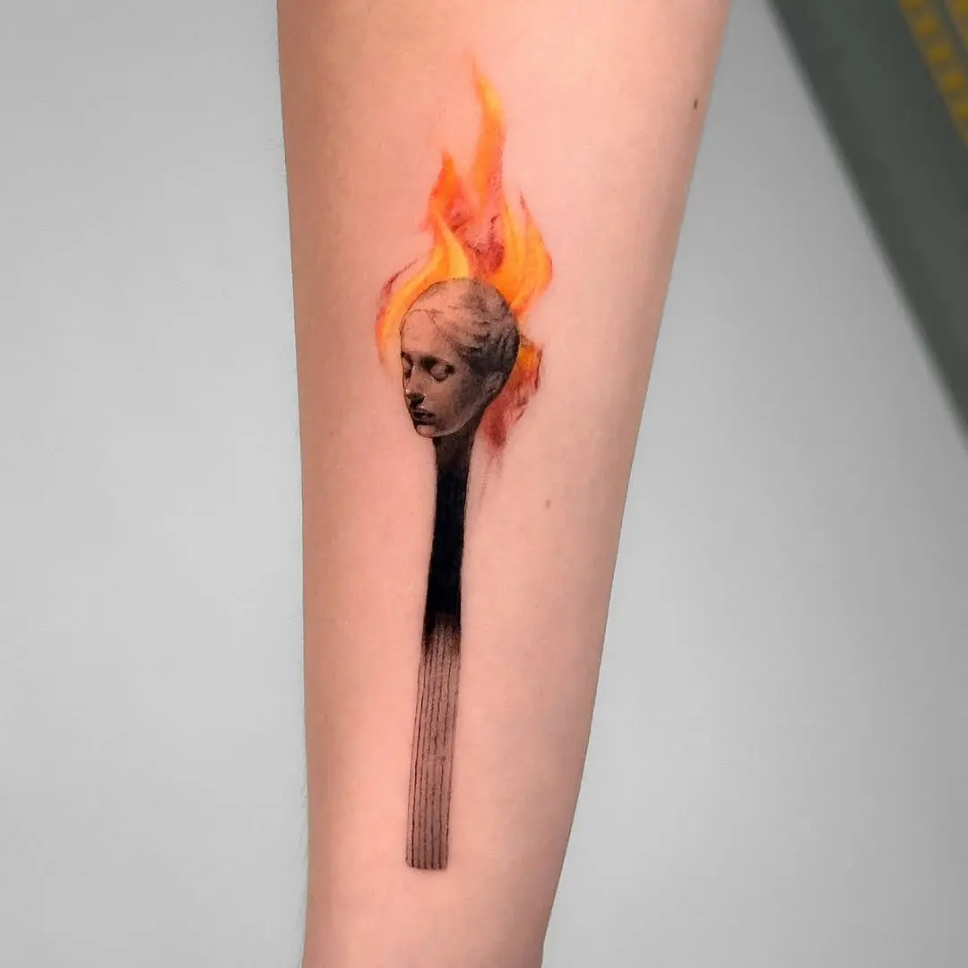 Unique Matchstick Fire Tattoo Featuring Human Face
