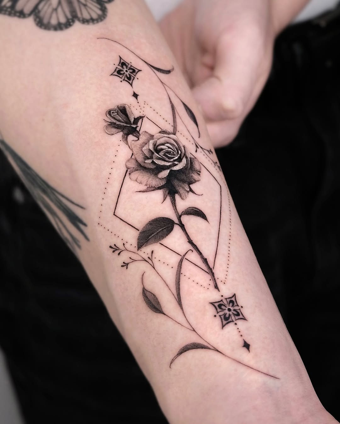 Elegant black and gray rose tattoo design