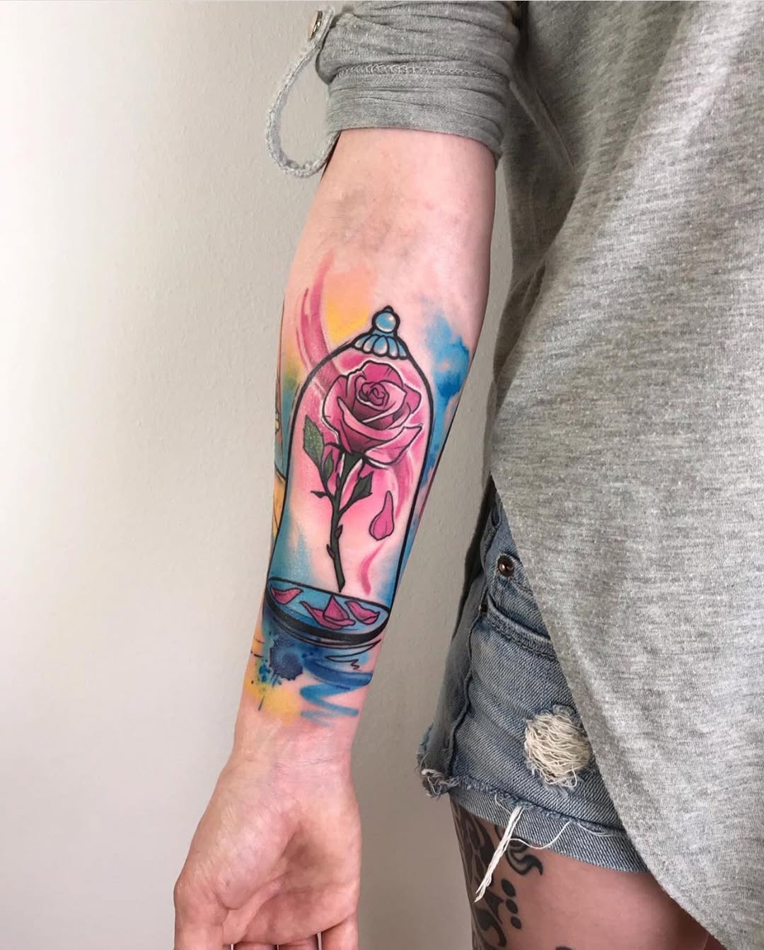 Vibrant rose in a whimsical glass jar