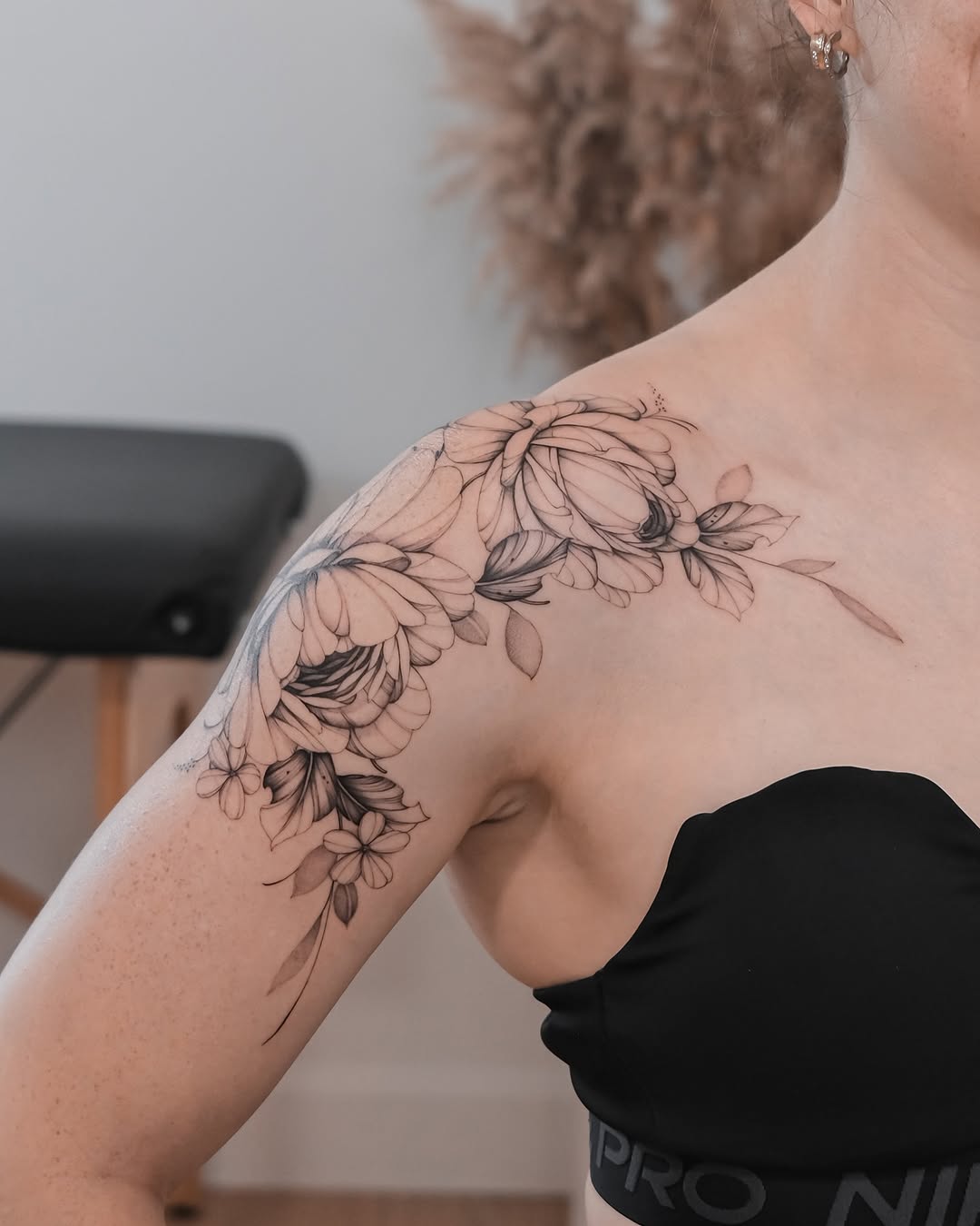 Elegant Rose Tattoo Design on Shoulder