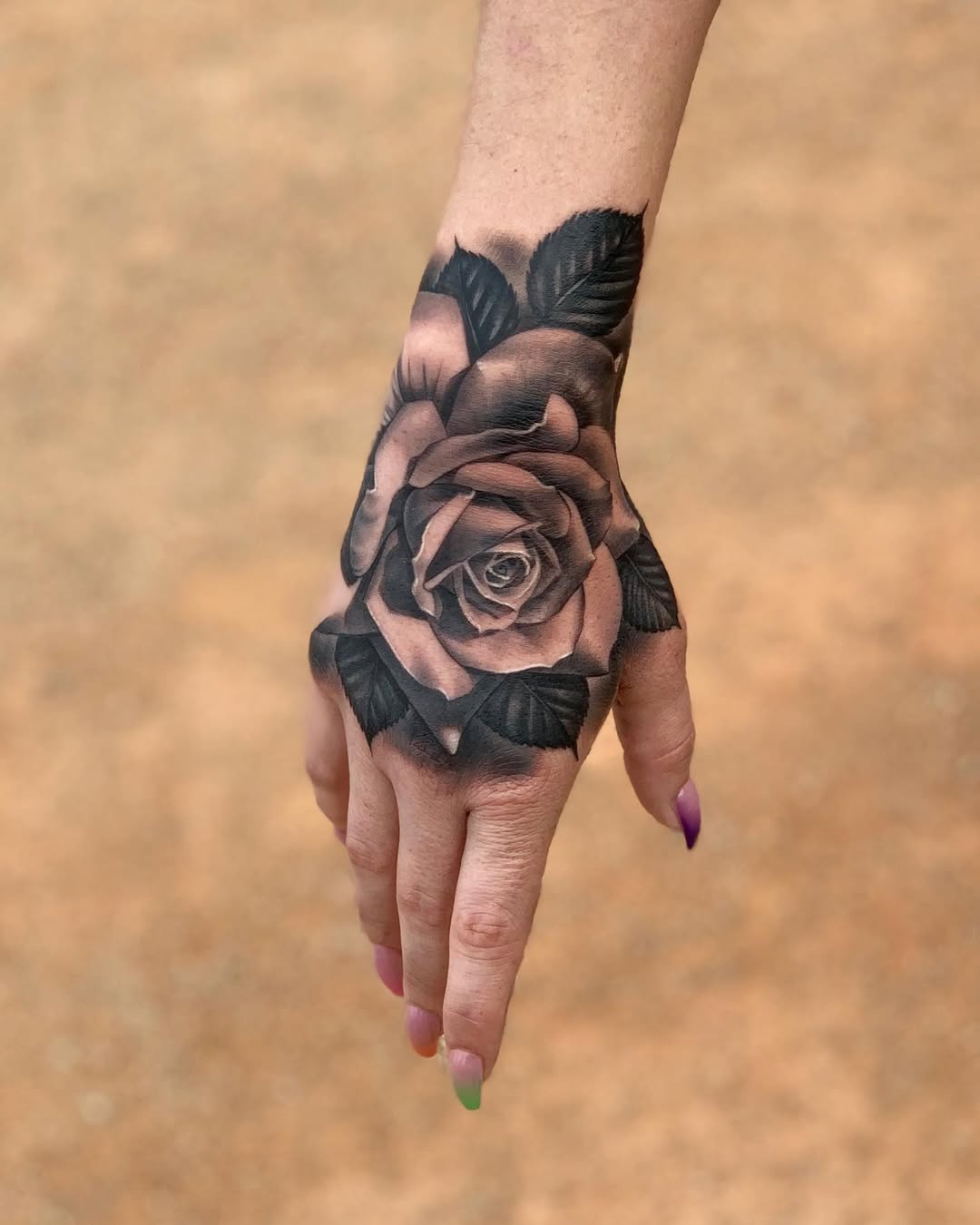 Stunning Black and Gray Rose Hand Tattoo