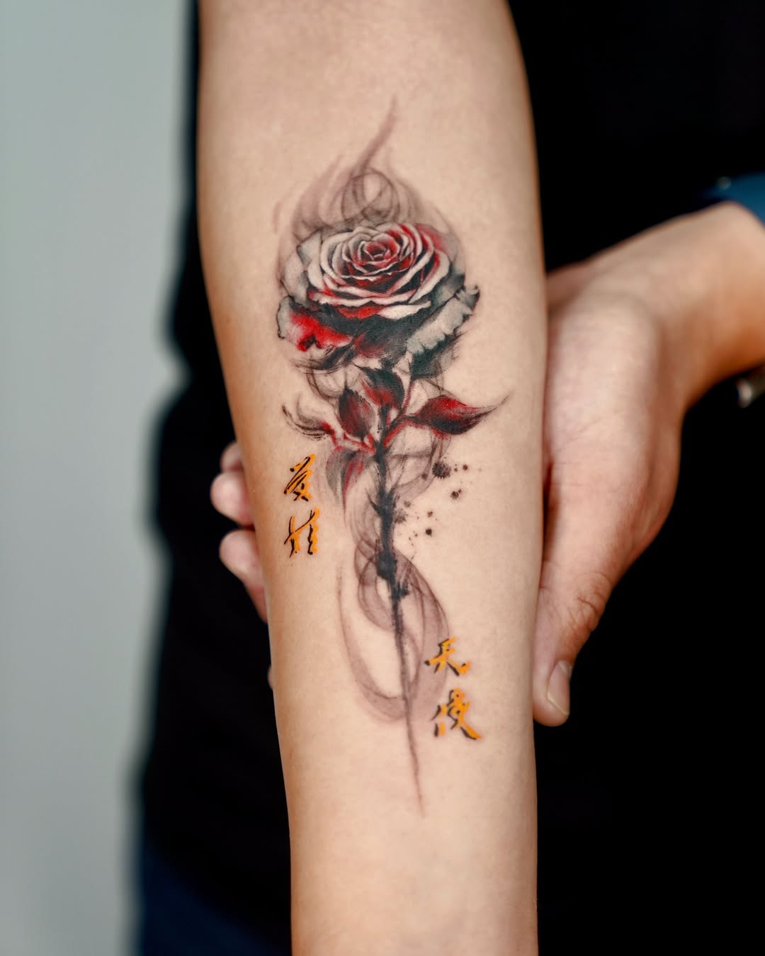 Striking rose tattoo with artistic flair