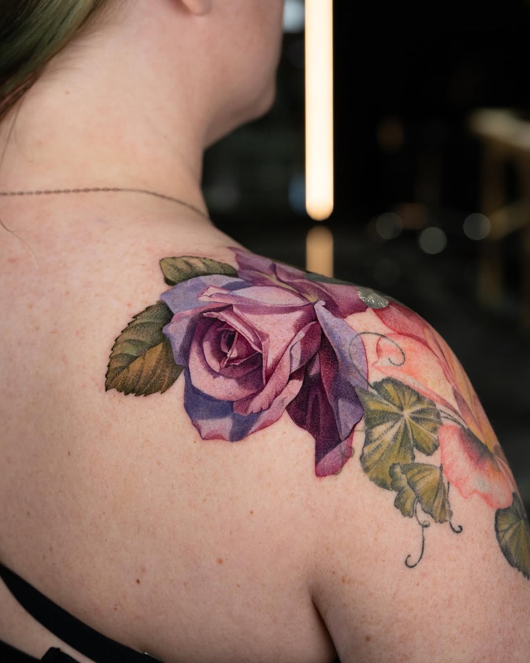 Stunning floral realism in rose tattoo design