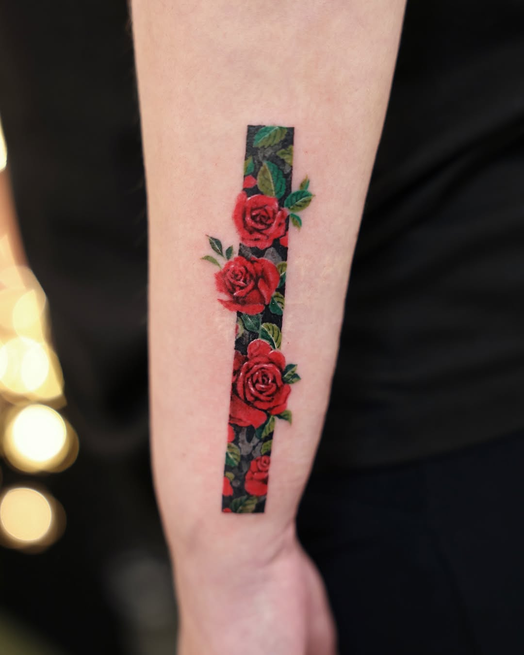 Stunning vertical rose tattoo design