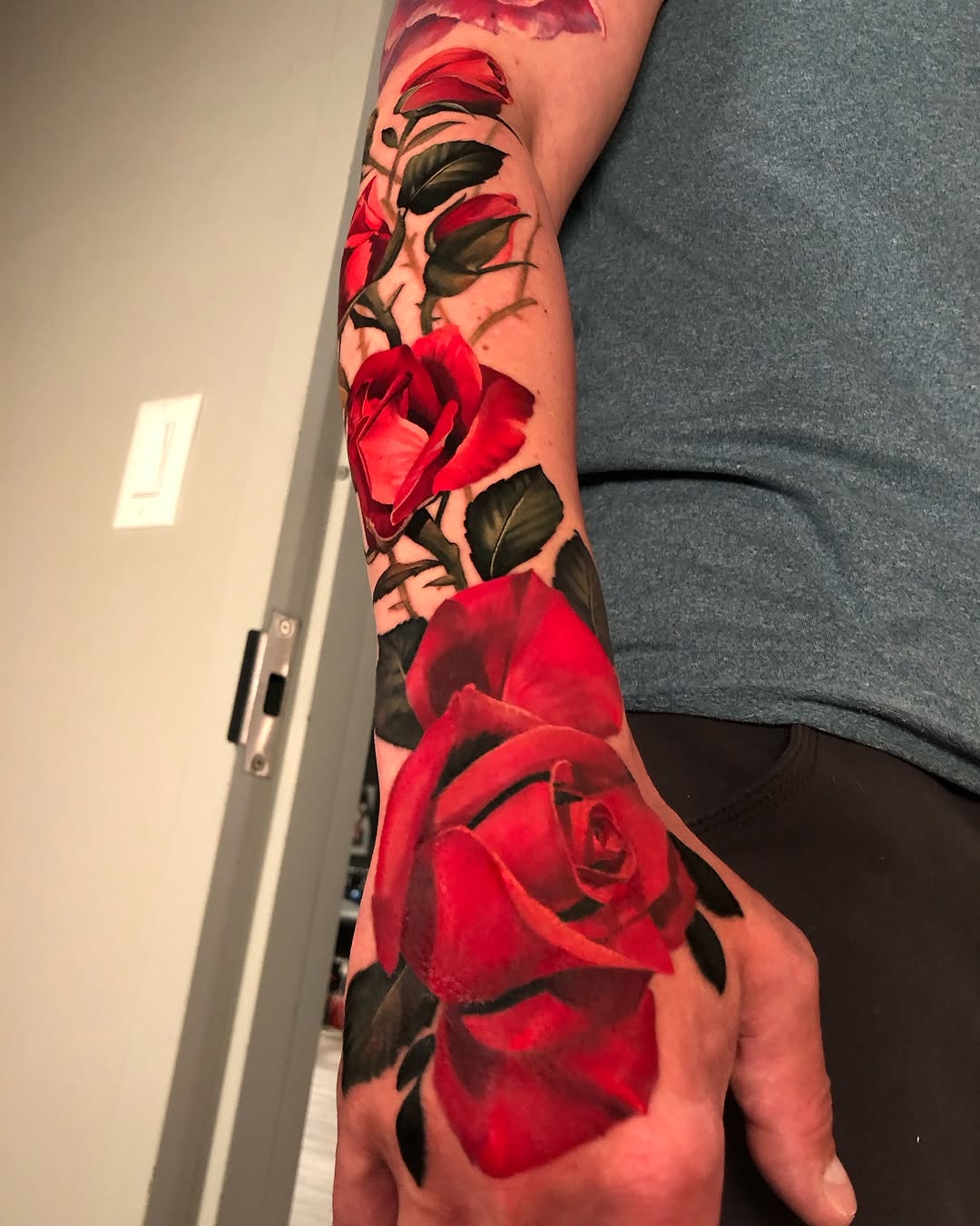 Stunning Full Arm Rose Tattoo Design