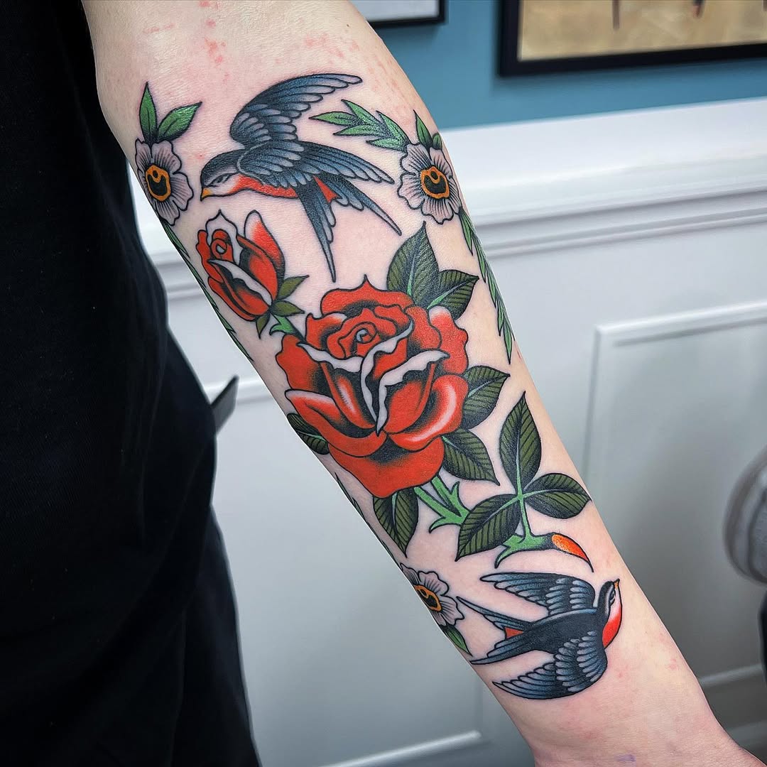 Vibrant Rose and Bird Sleeve Tattoo Design