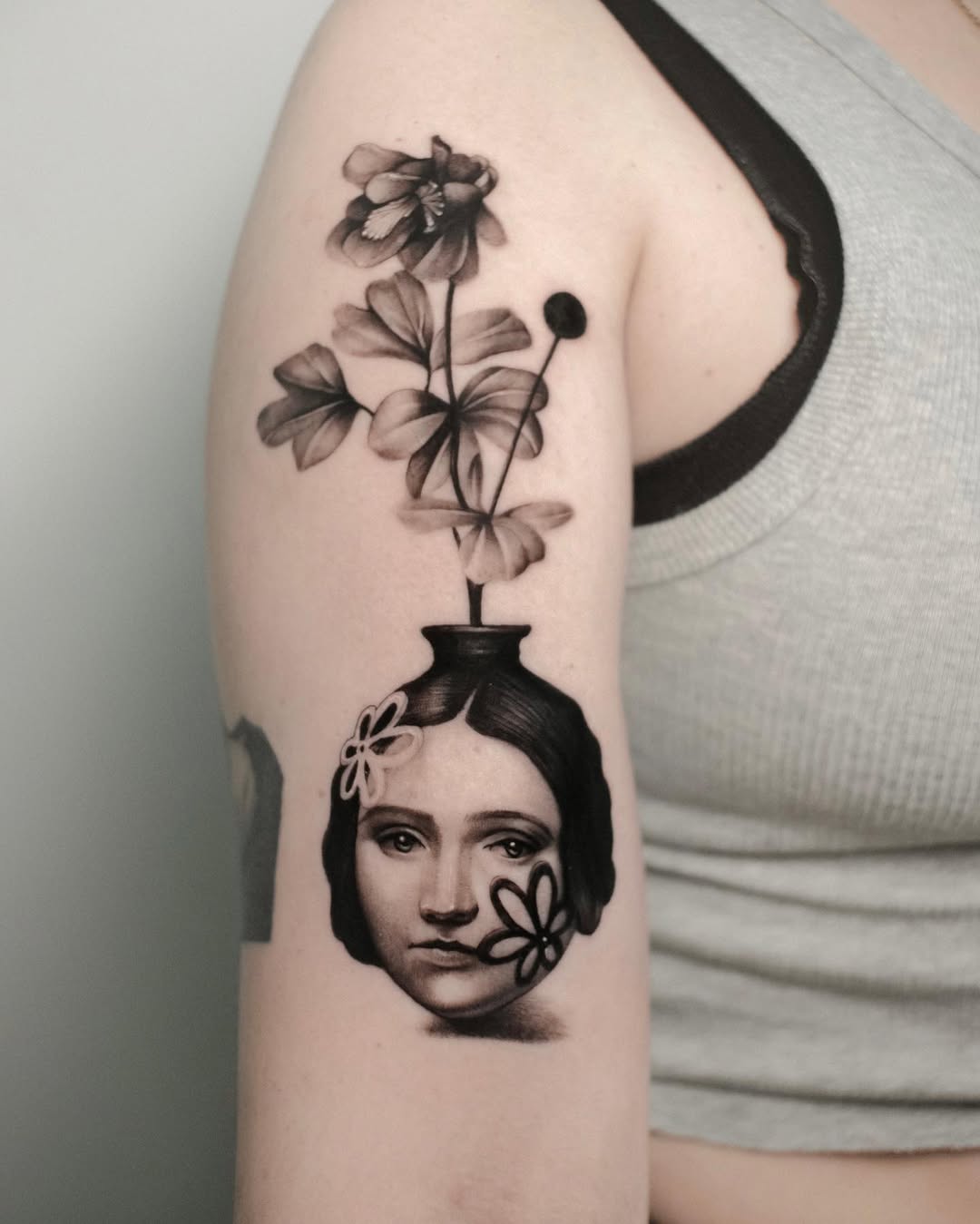 Emotional floral portrait tattoo concept