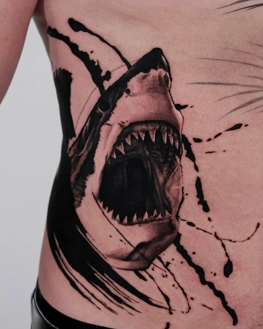 Stunning aggressive shark tattoo on ribcage