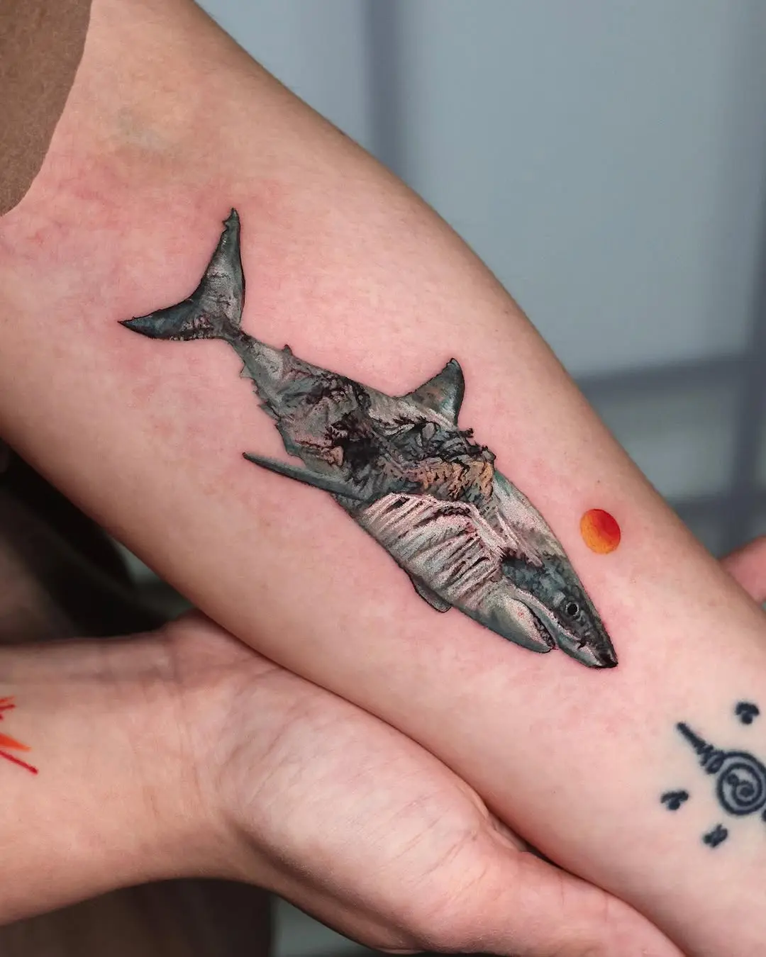 Intricate shark tattoo with vibrant colors