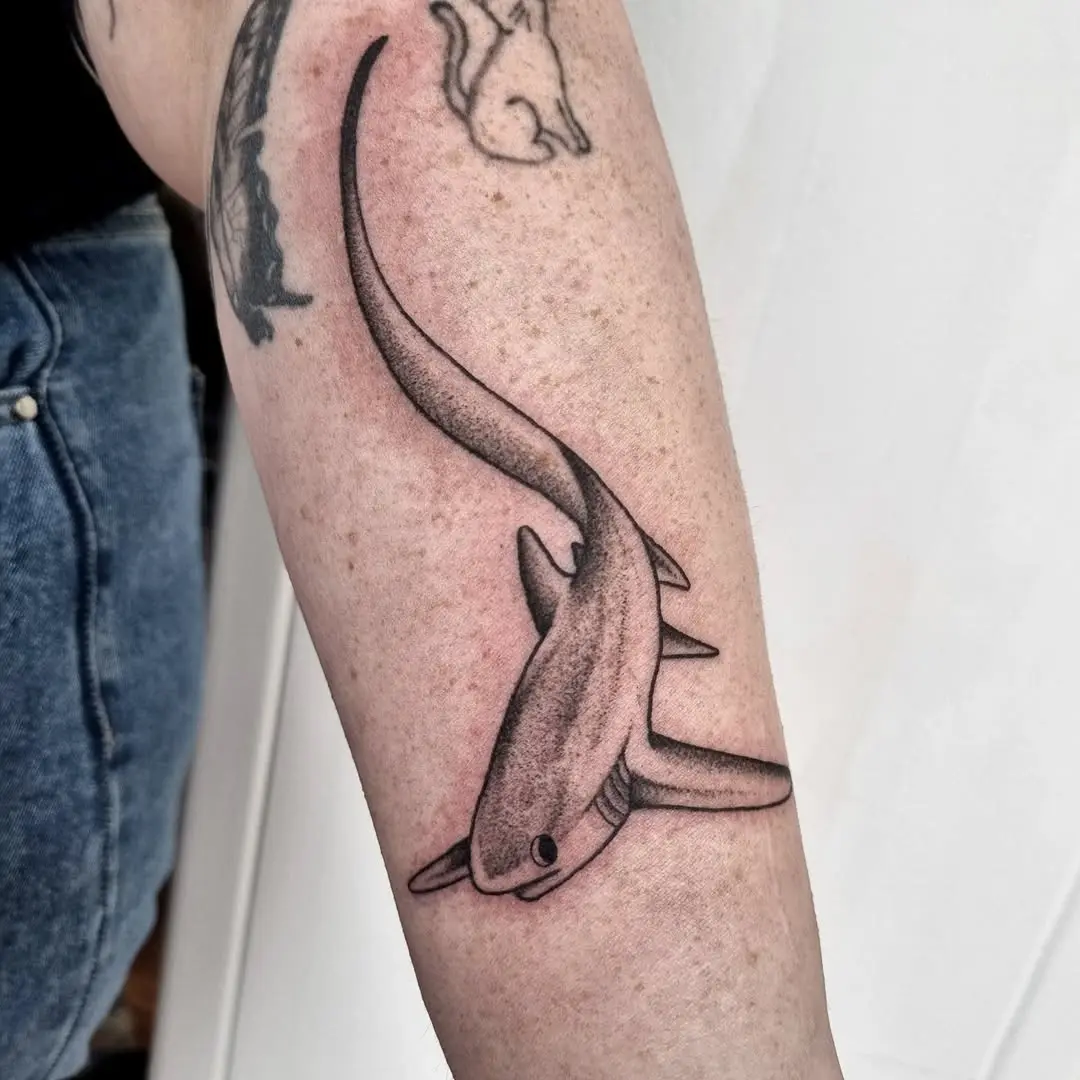 Elegant shark tattoo showcasing sleek design