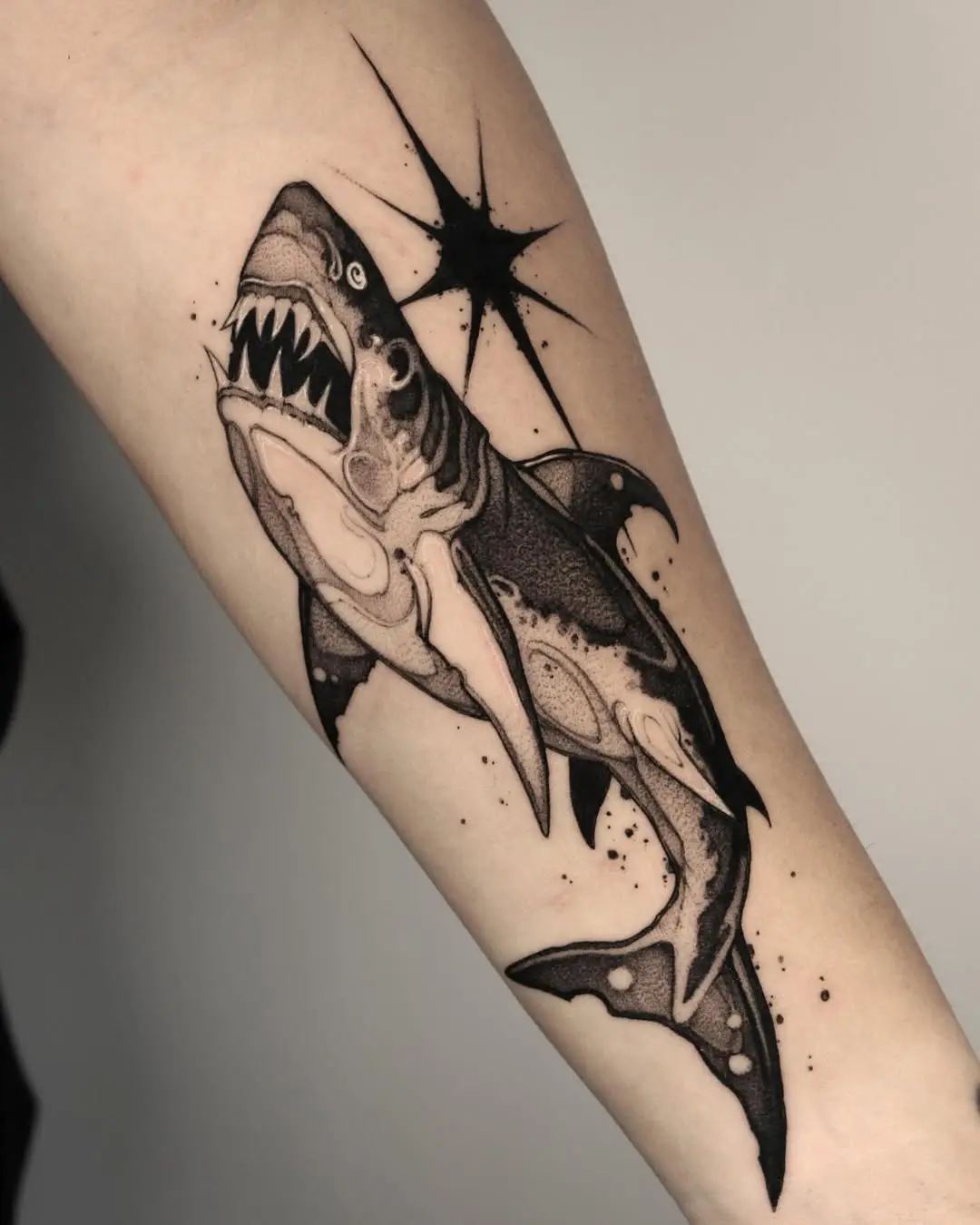 Stunning black ink shark tattoo design