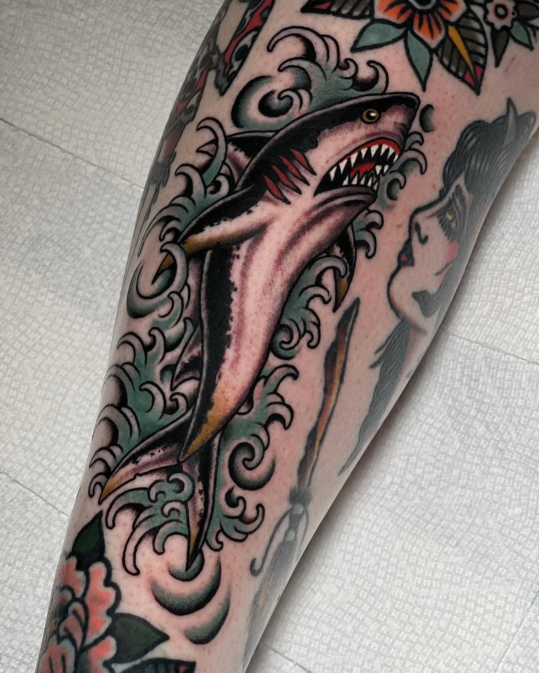 Stunning Shark Tattoo with Floral Accents