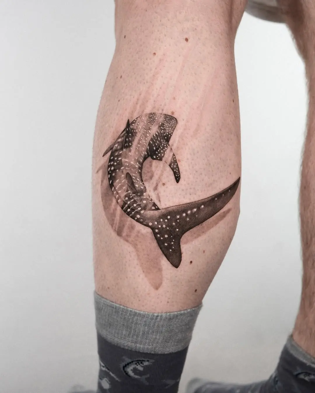 Stunning whale shark tattoo on leg