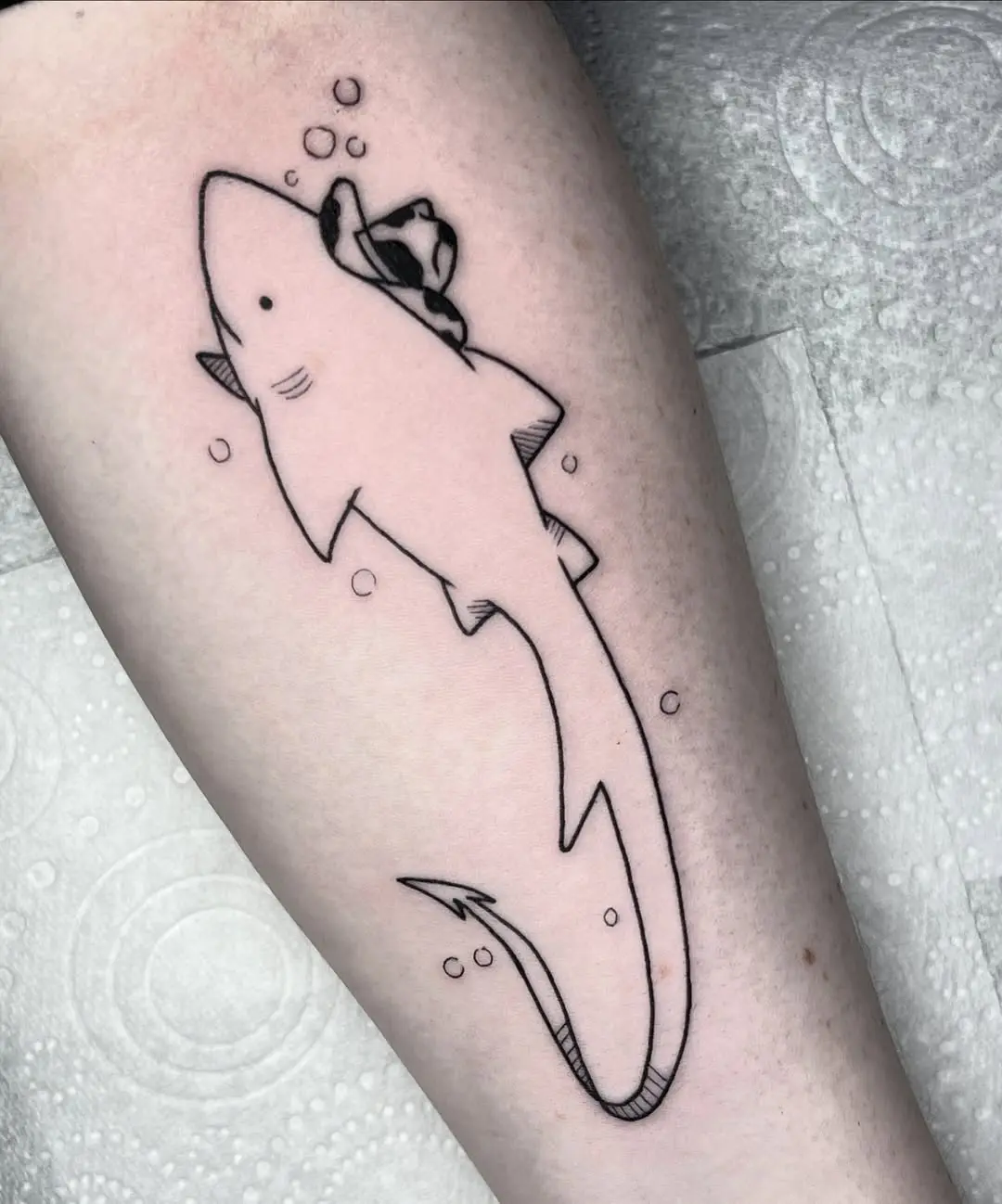 Stylish shark tattoo with a rose accent