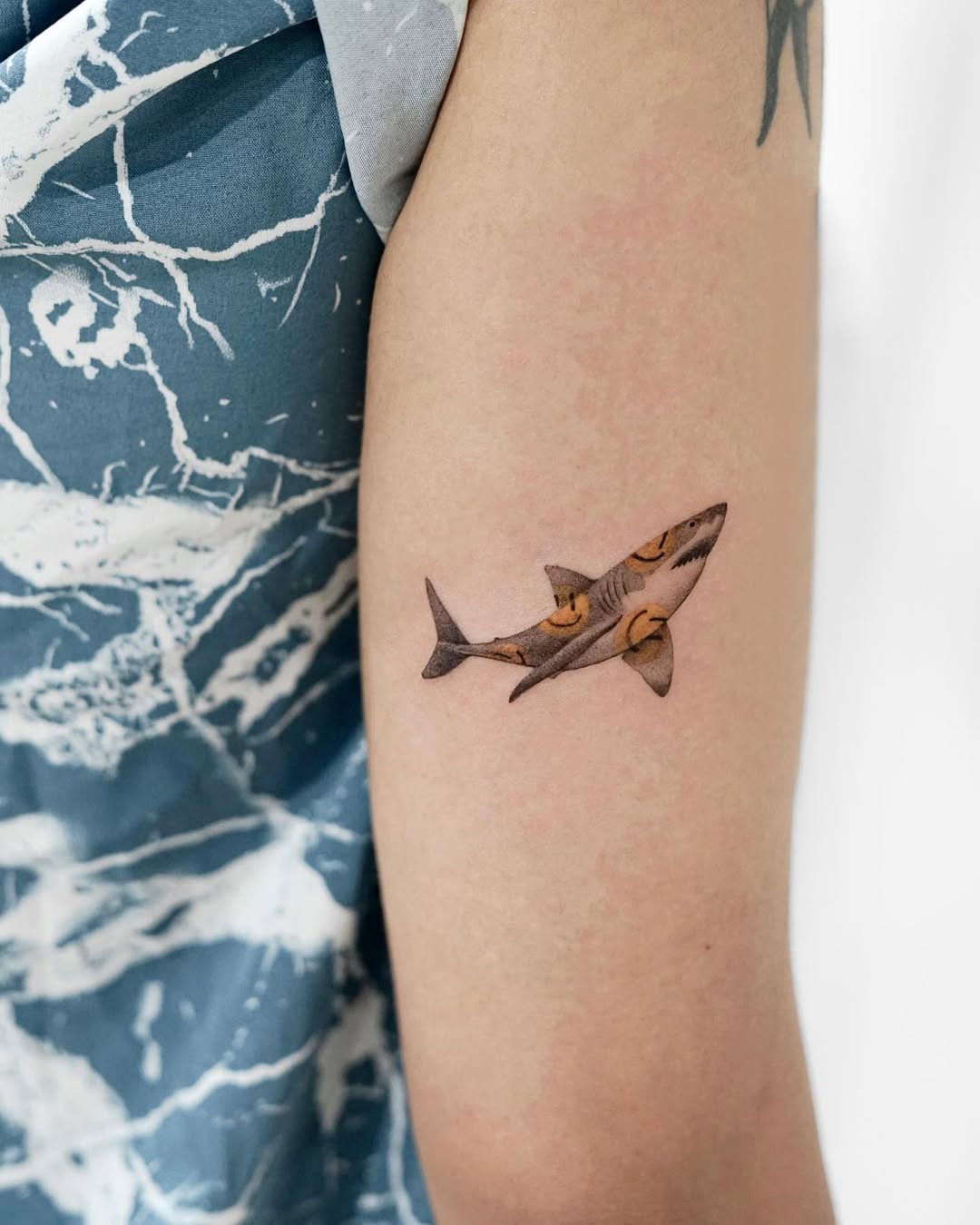 Vibrant shark tattoo with intricate details