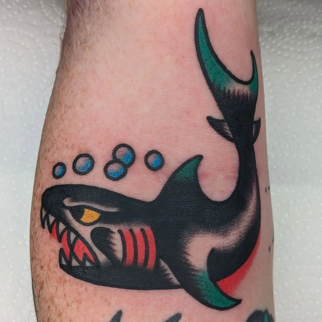 Stylish shark tattoo with vibrant colors