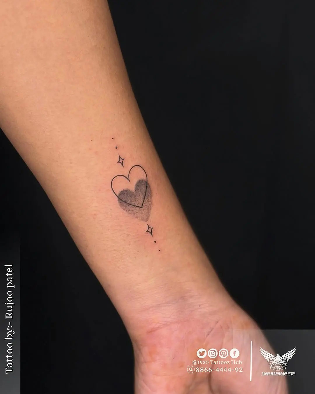 Charming small heart tattoo design for women