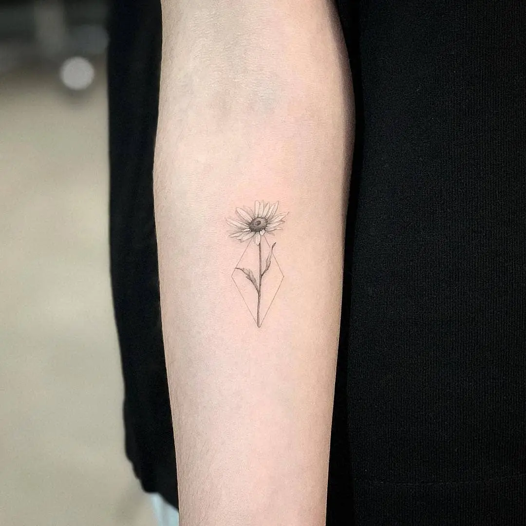 Delicate flower tattoo showcasing minimalist charm