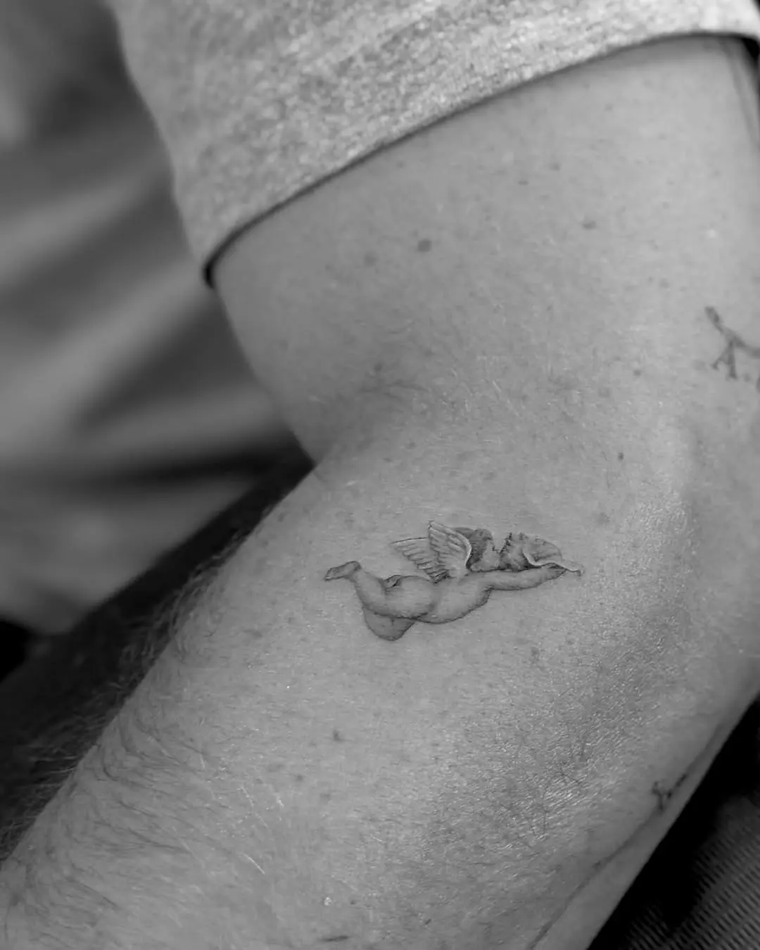 Delicate Cherub Tattoo in Black and White
