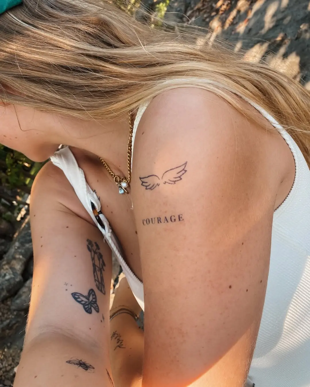 Elegant Small Tattoo Symbolizing Courage