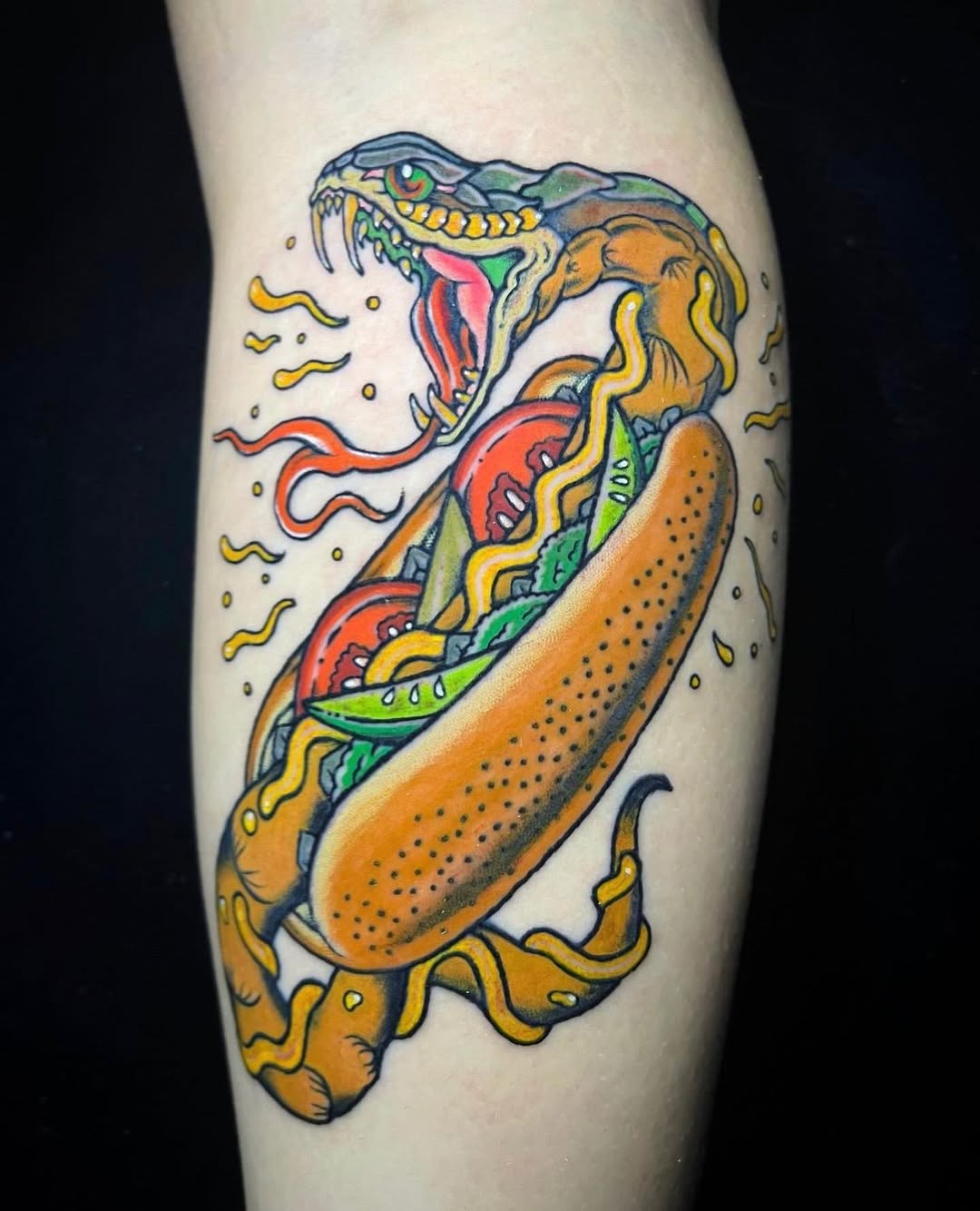 Vibrant snake entwined with a hotdog tattoo