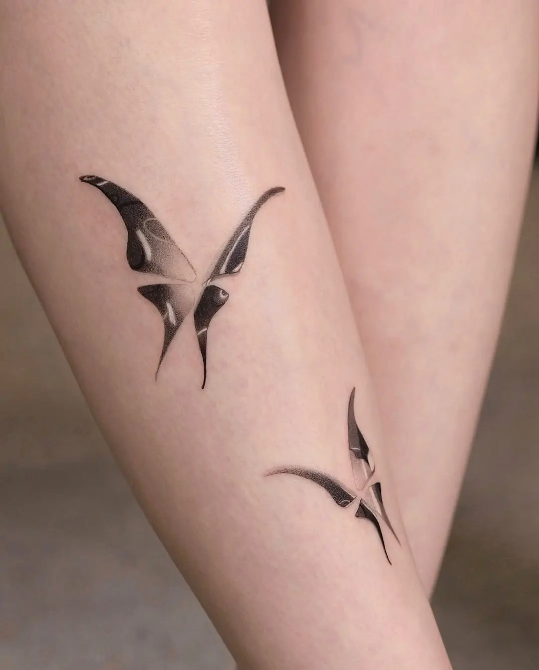 Intricate butterfly tattoo design on leg skin