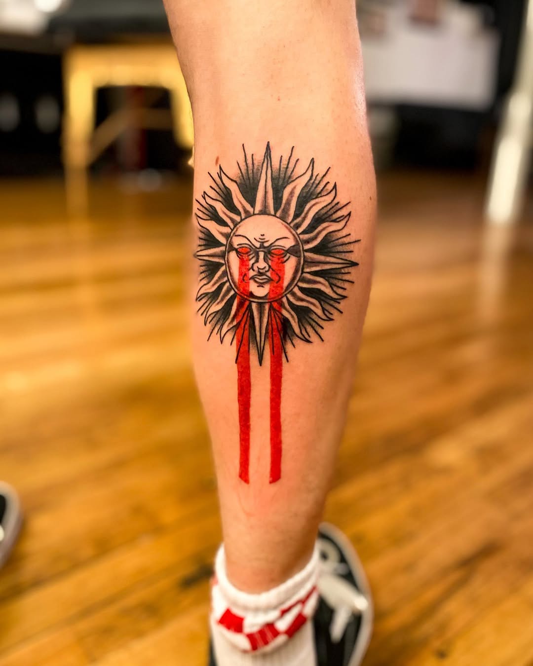 Vibrant Sun Tattoo with Intricate Details