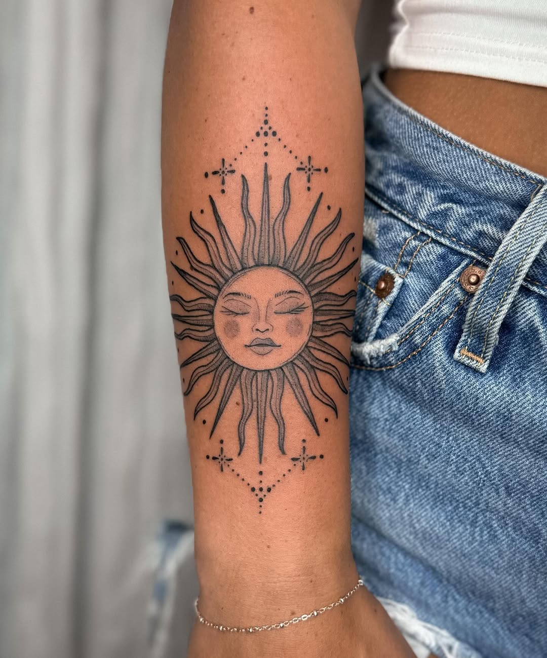 Minimalist Sun Tattoo with Boho Vibes