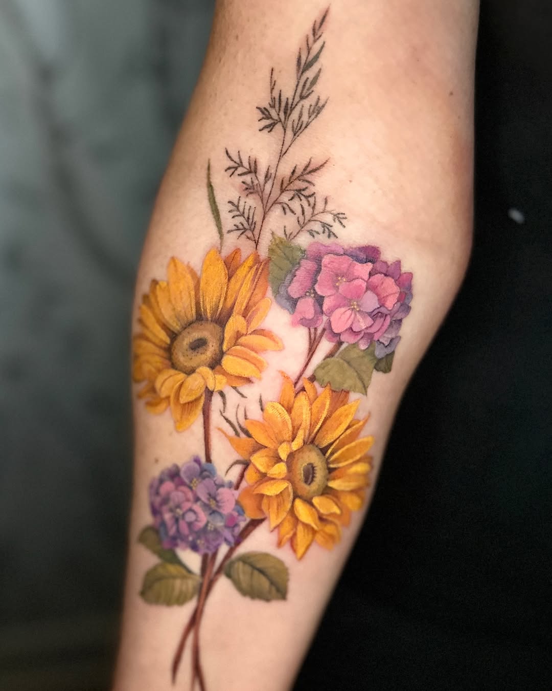 Vibrant sunflower tattoo bursting with life