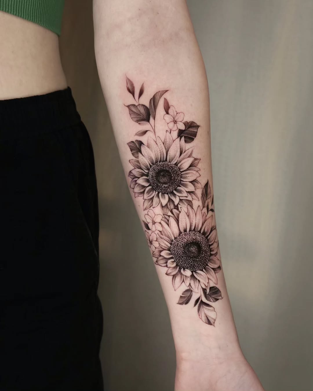 Elegant black and white sunflower tattoo design