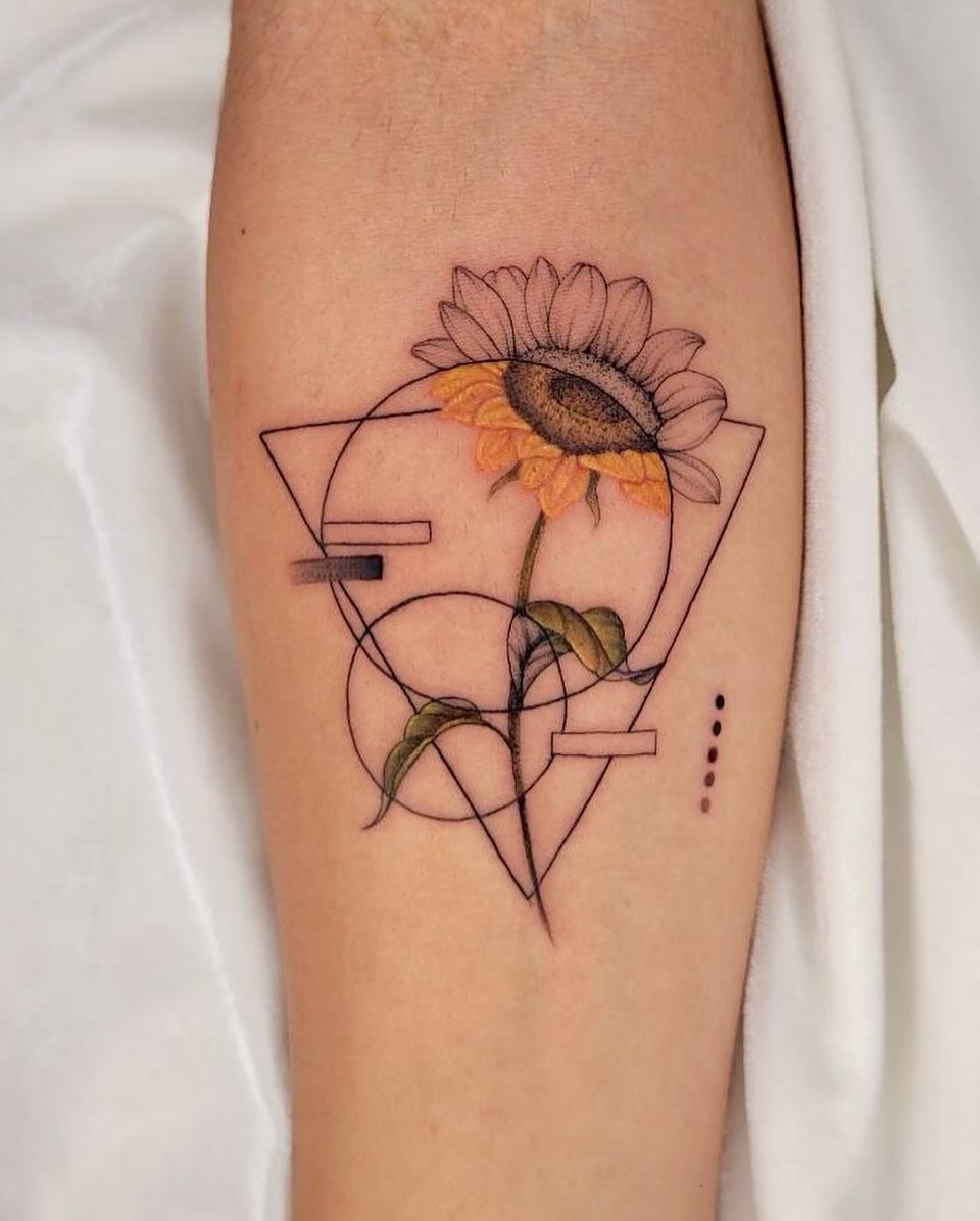 Geometric sunflower tattoo with elegant lines