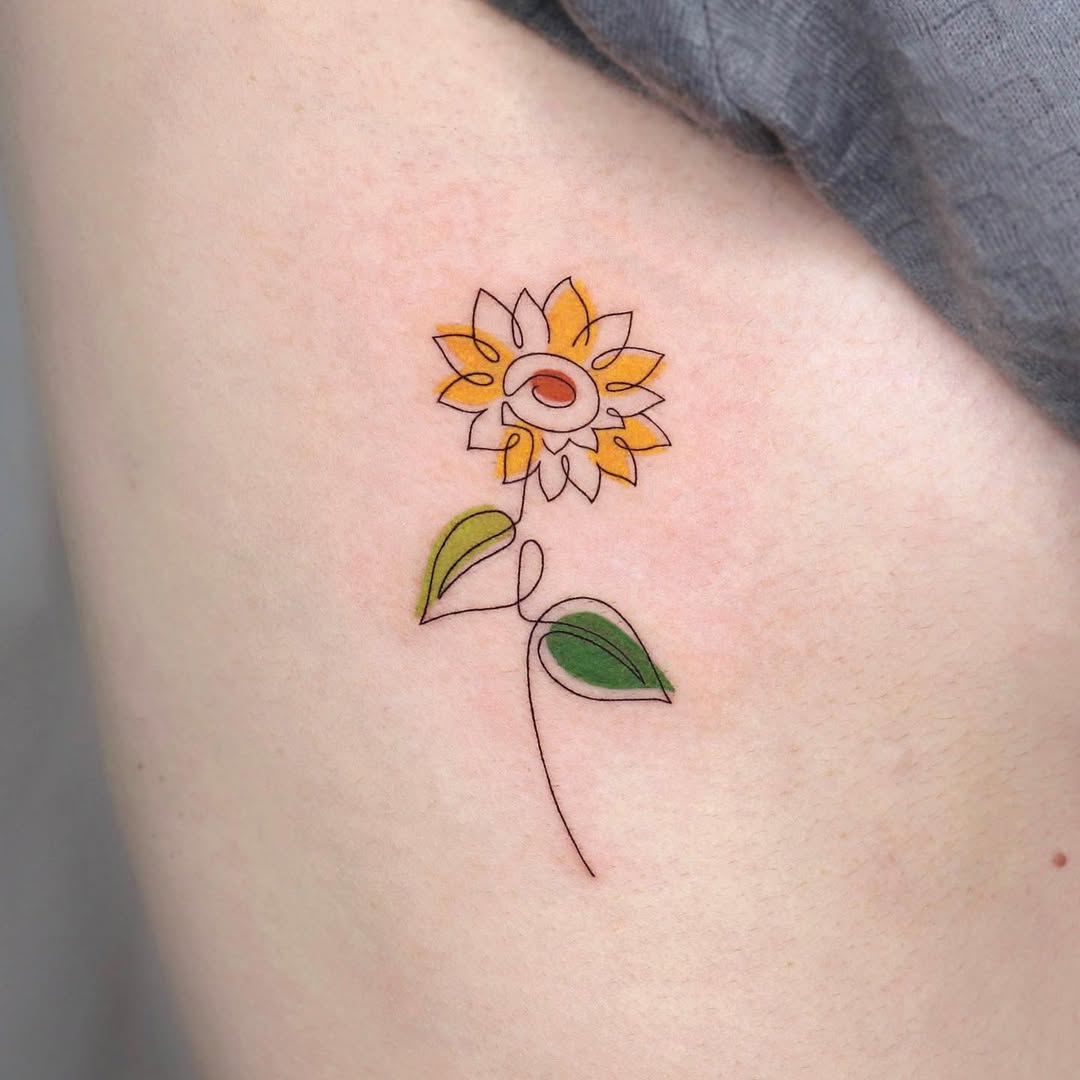 Minimalist sunflower tattoo with a modern twist