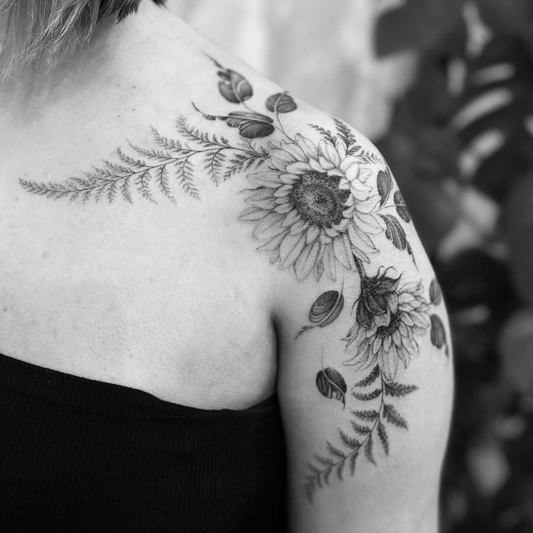 Stunning black and white sunflower tattoo design