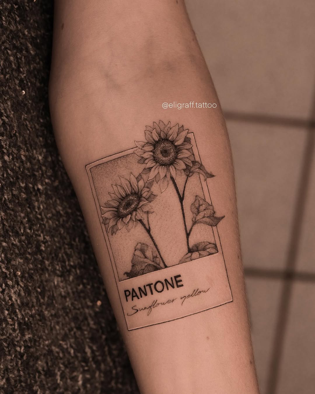 Elegant sunflower tattoo with Pantone touch