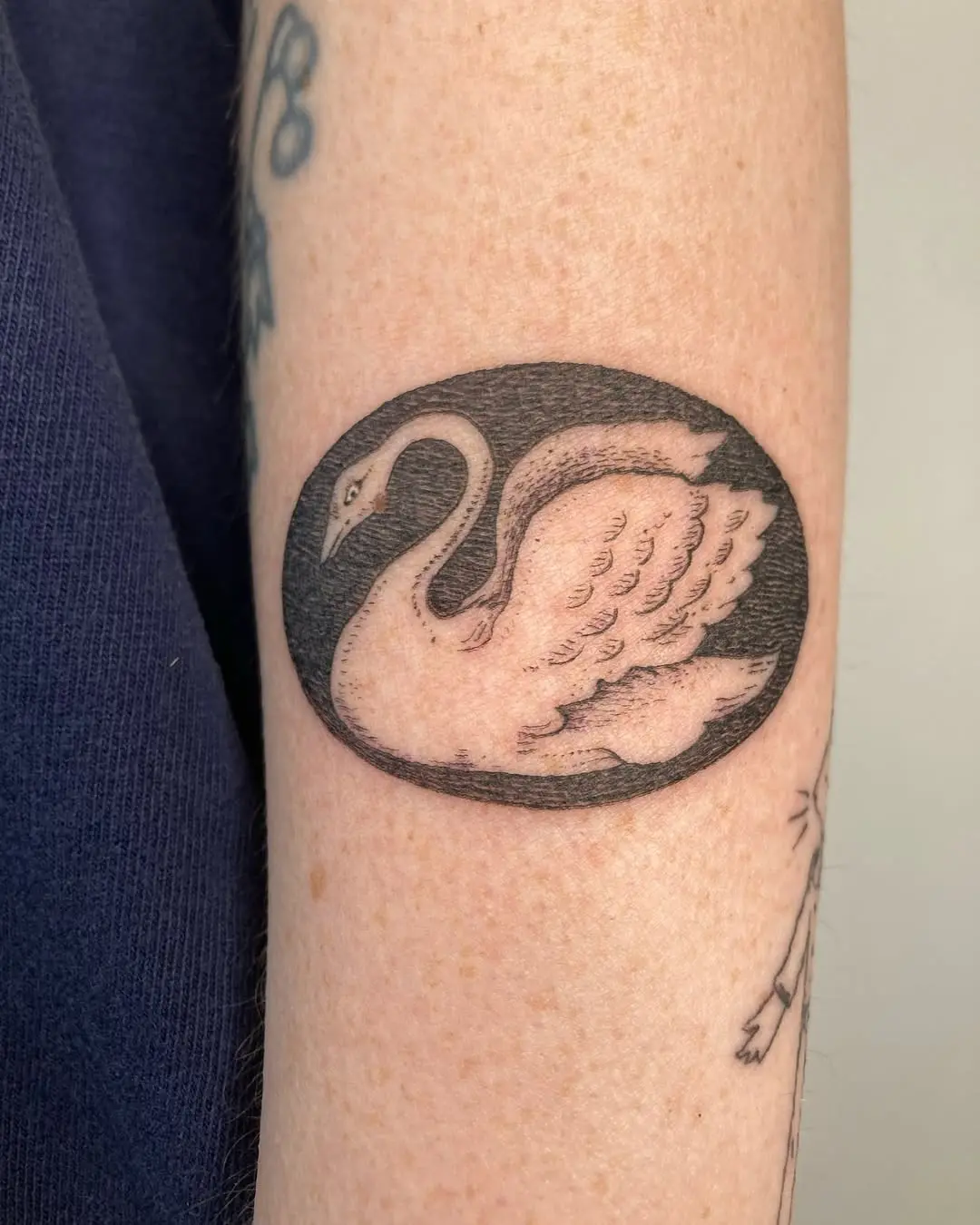 Elegant swan tattoo in a classic style