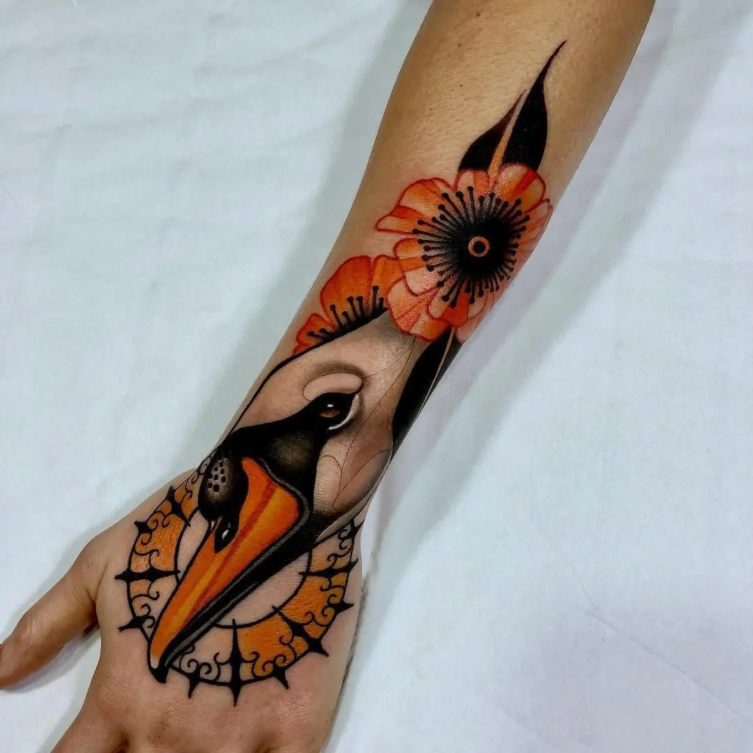 Elegant Swan Tattoo with Floral Elements