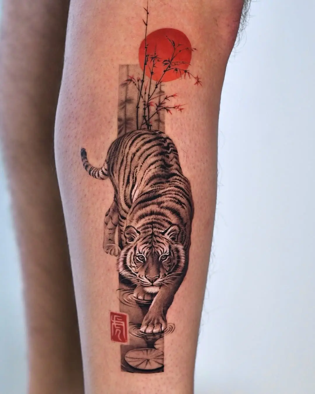 Majestic tiger tattoo on a serene backdrop