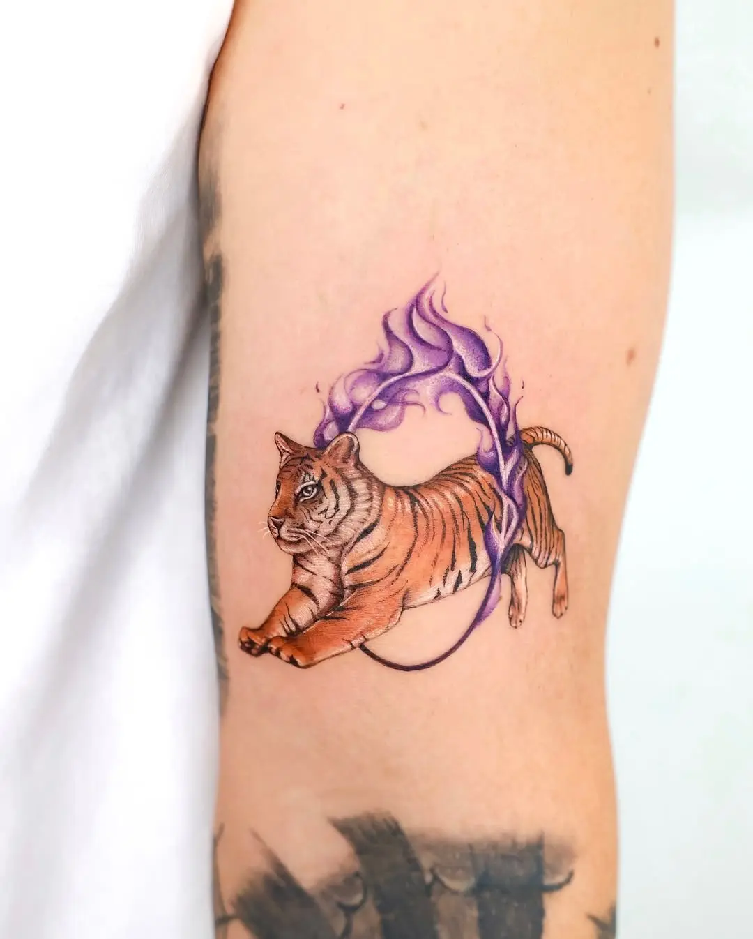 Vibrant Tiger Tattoo with Purple Flames