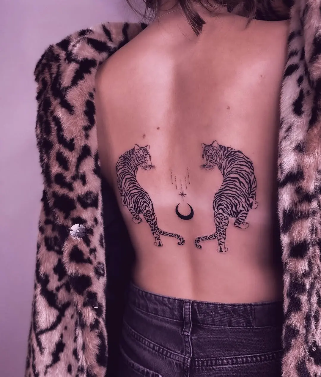 Stunning twin tigers and crescent moon tattoo