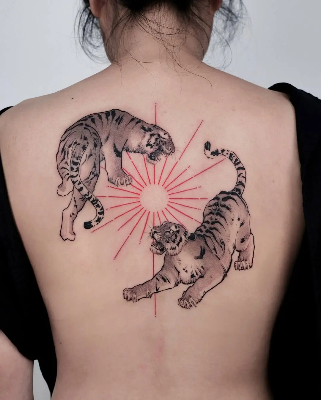 Striking Tiger Tattoo with Radiant Background