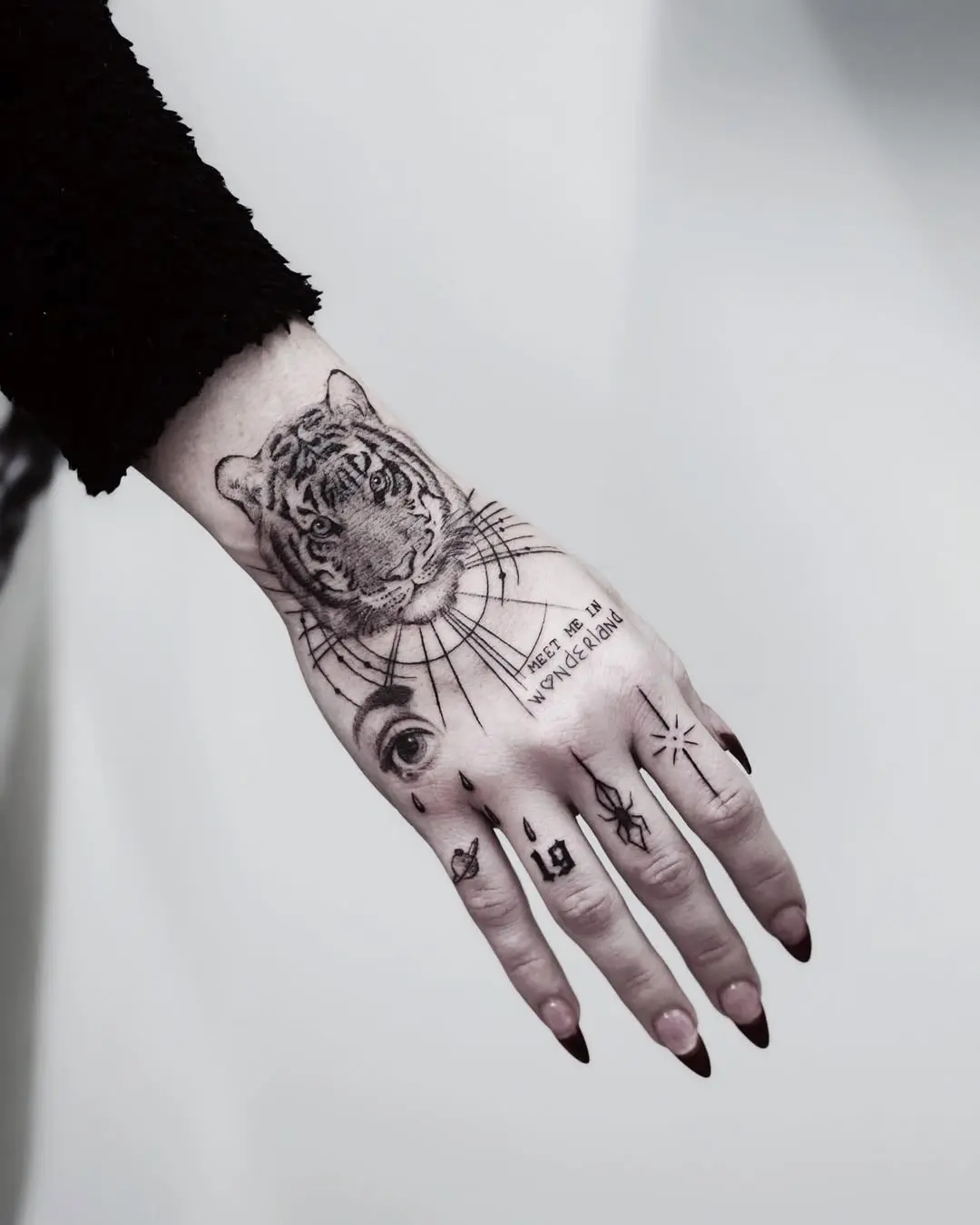 Elegant tiger tattoo with celestial elements