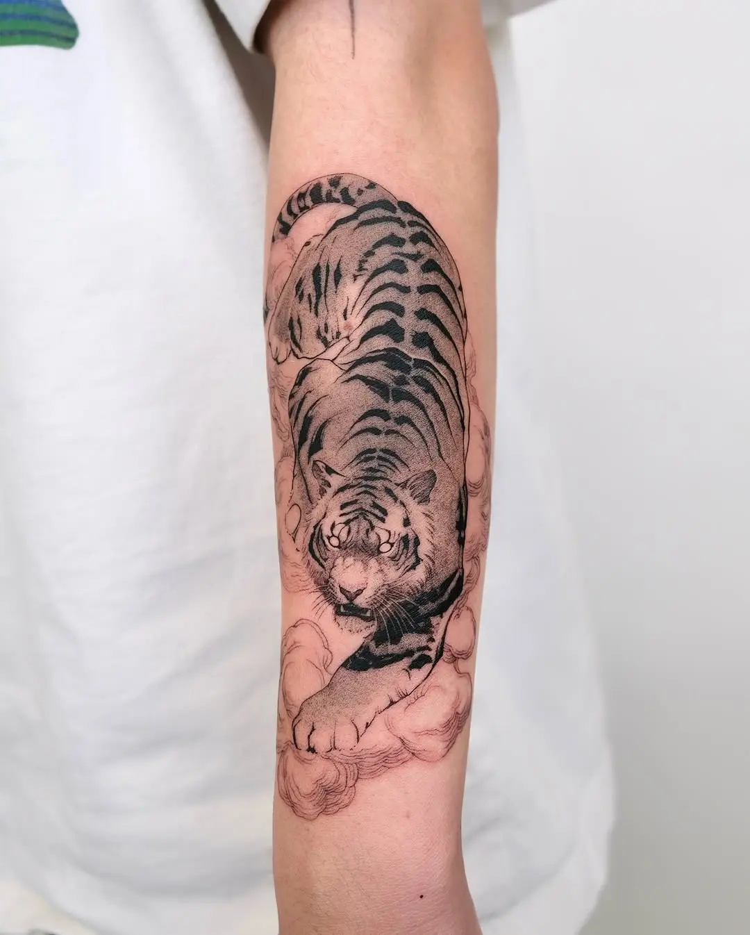 Realistic tiger tattoo showcasing strength and beauty
