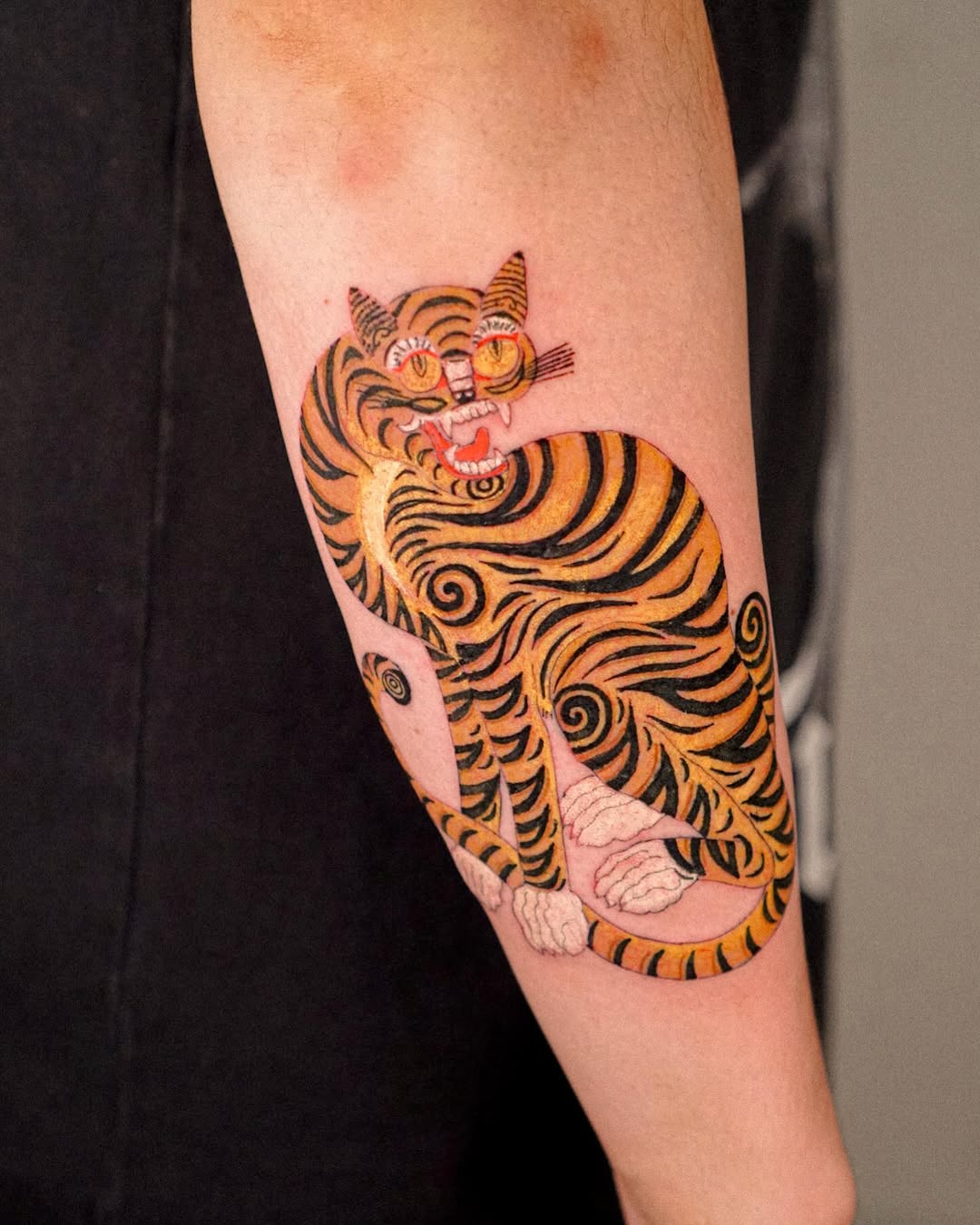 Unique tiger tattoo with vibrant colors and patterns