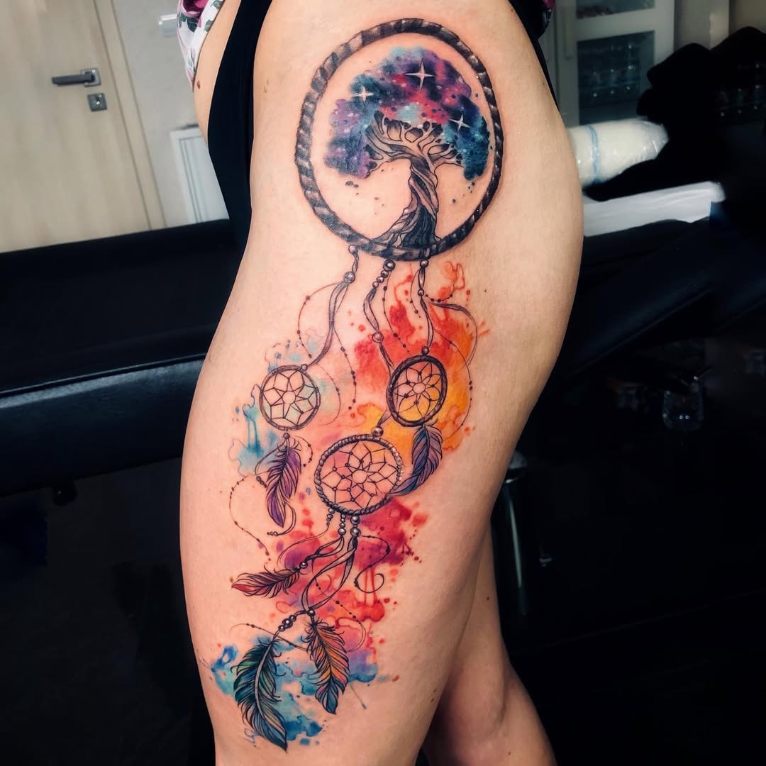 Vibrant watercolor tree of life tattoo
