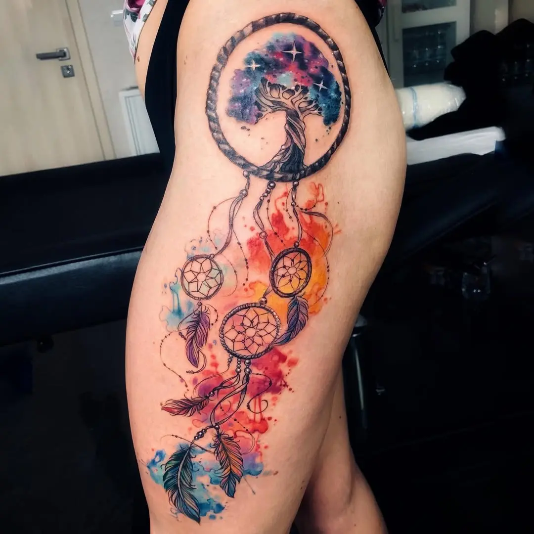 Vibrant watercolor tree of life tattoo