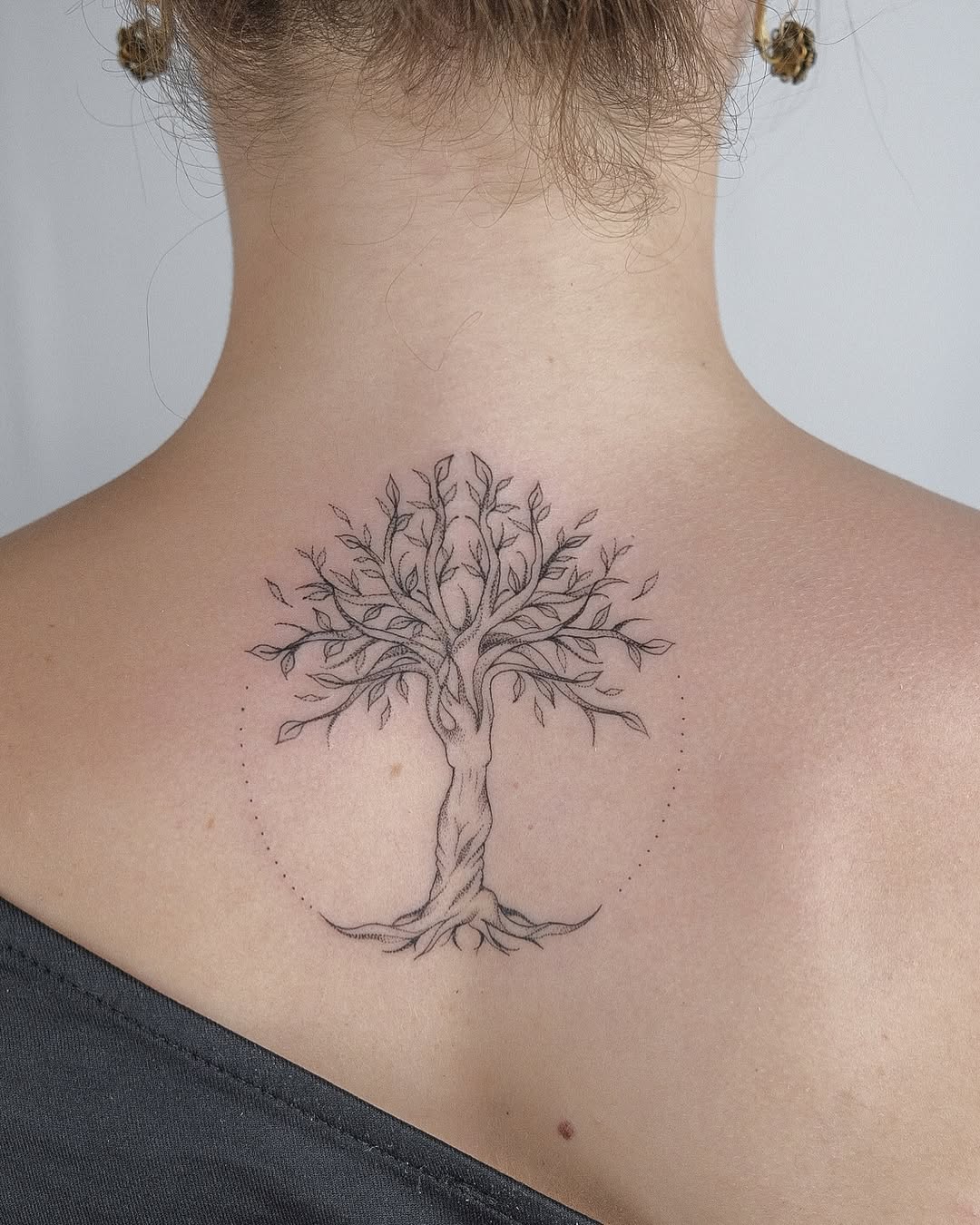 Elegantly detailed tree of life tattoo design