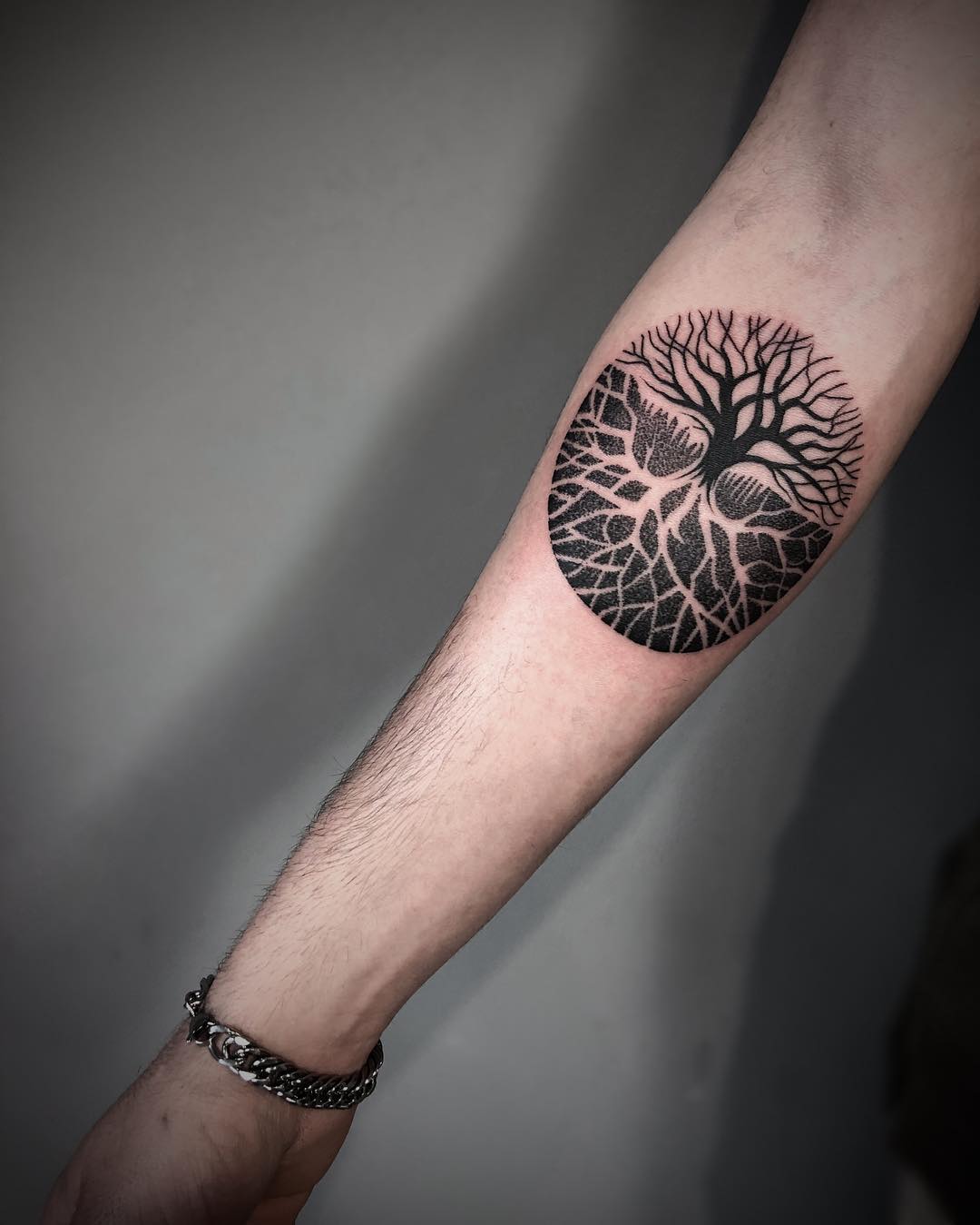 Stunning black silhouette tree of life tattoo